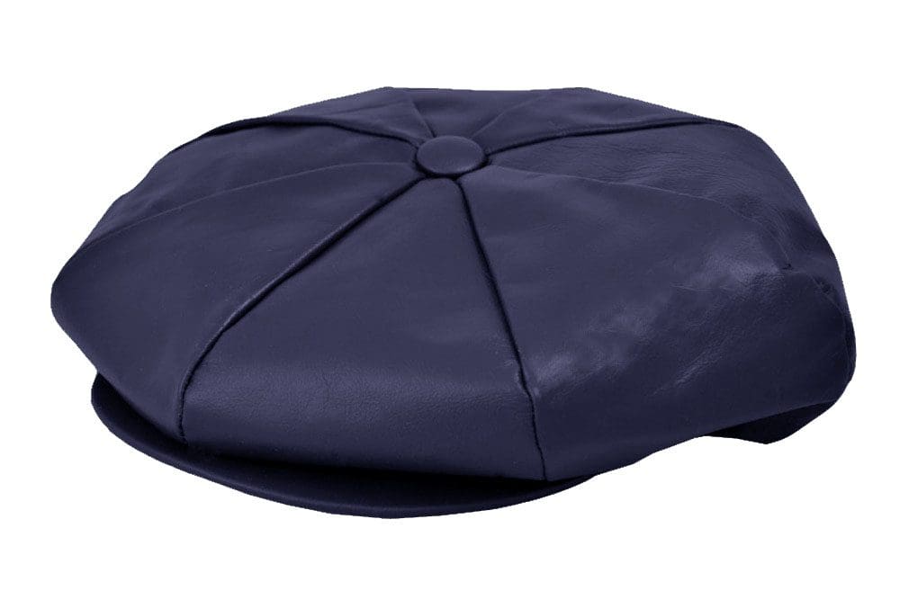 A blue hat is sitting on top of the floor.