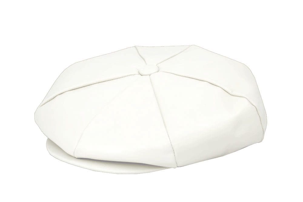 A white hat is sitting on top of the floor.