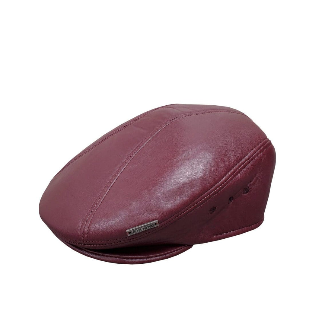 A red leather cap is shown with a black band.
