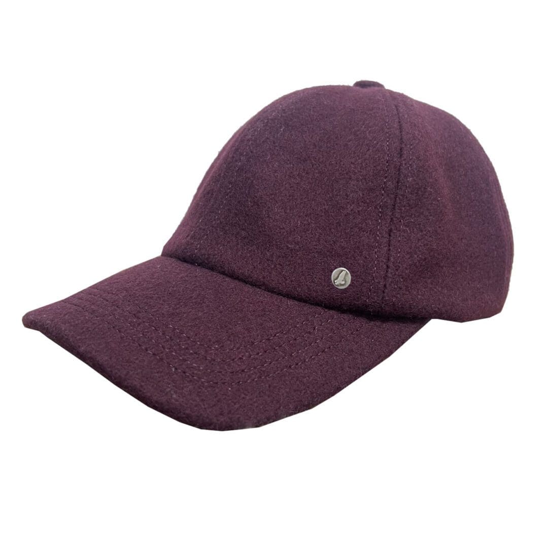 A purple hat is on the ground
