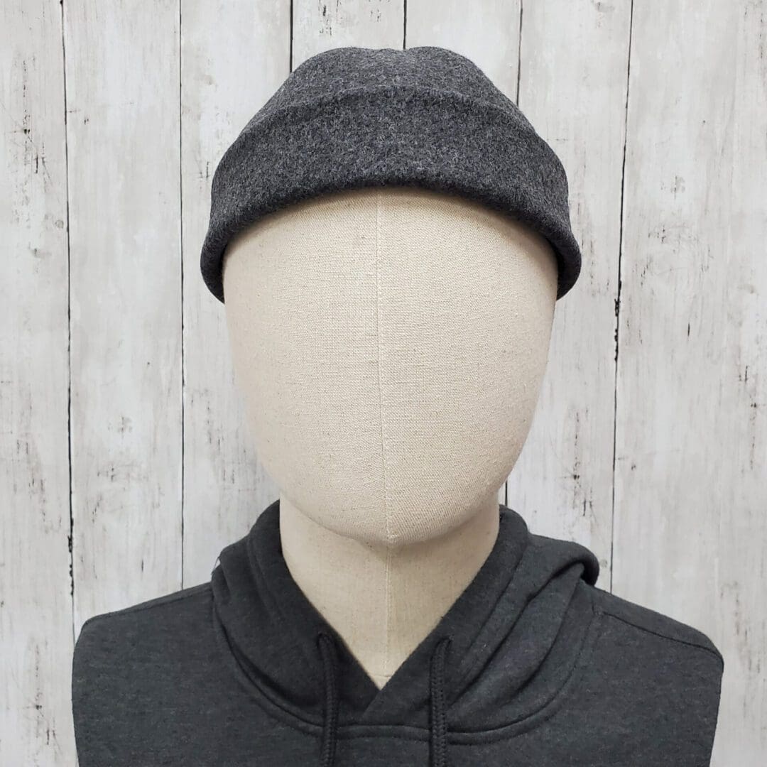 A person with a hat on their head