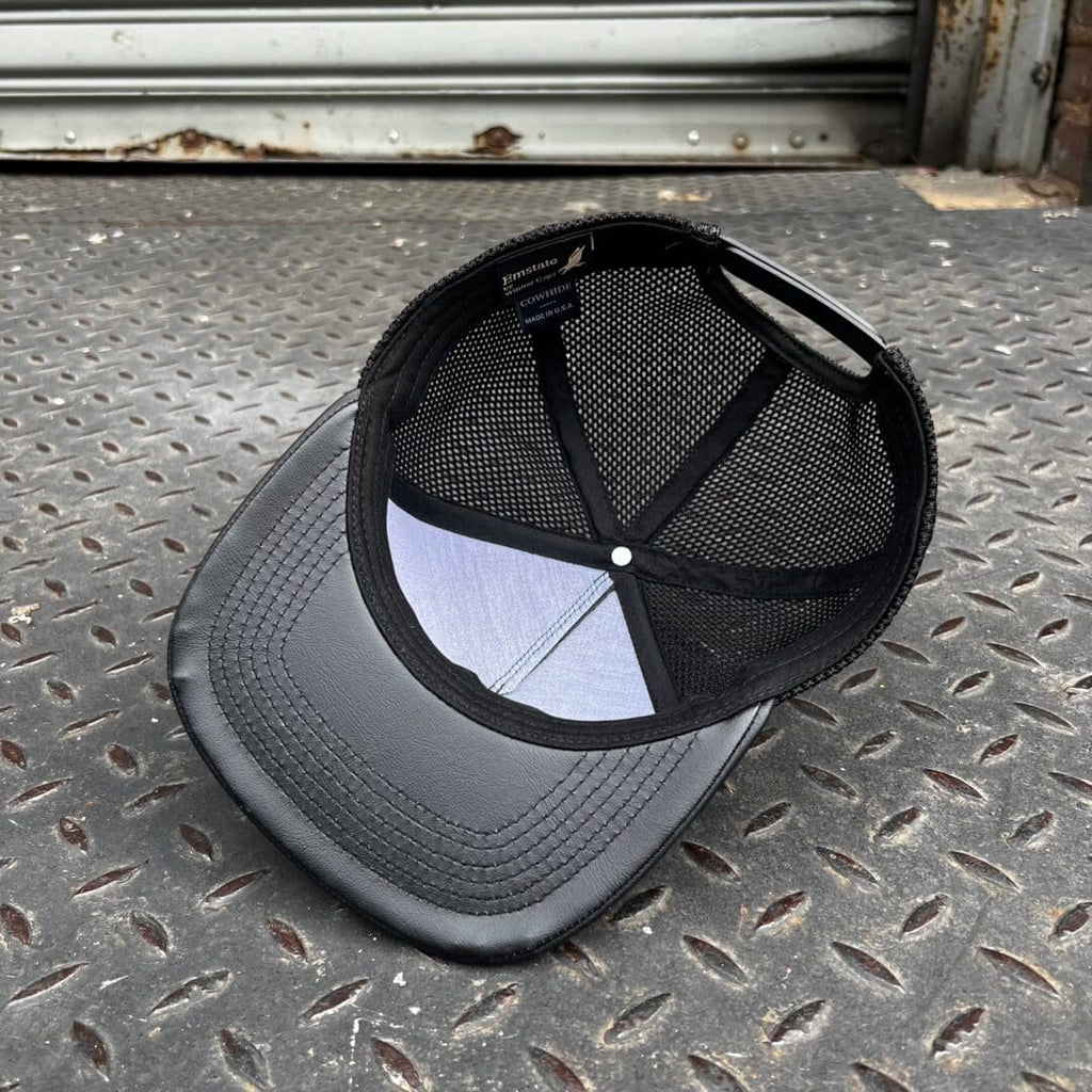 A hat that is laying on the ground.
