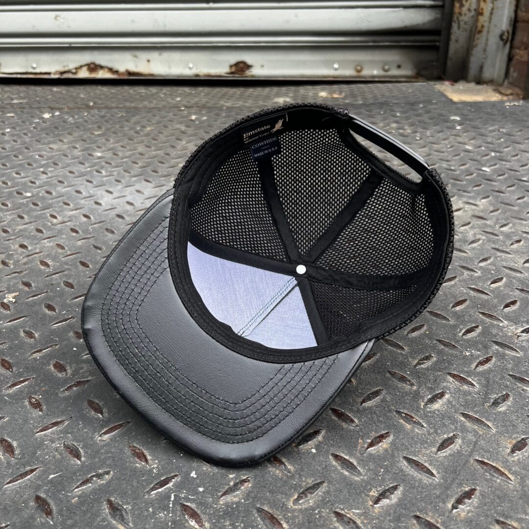 A hat that is laying on the ground.
