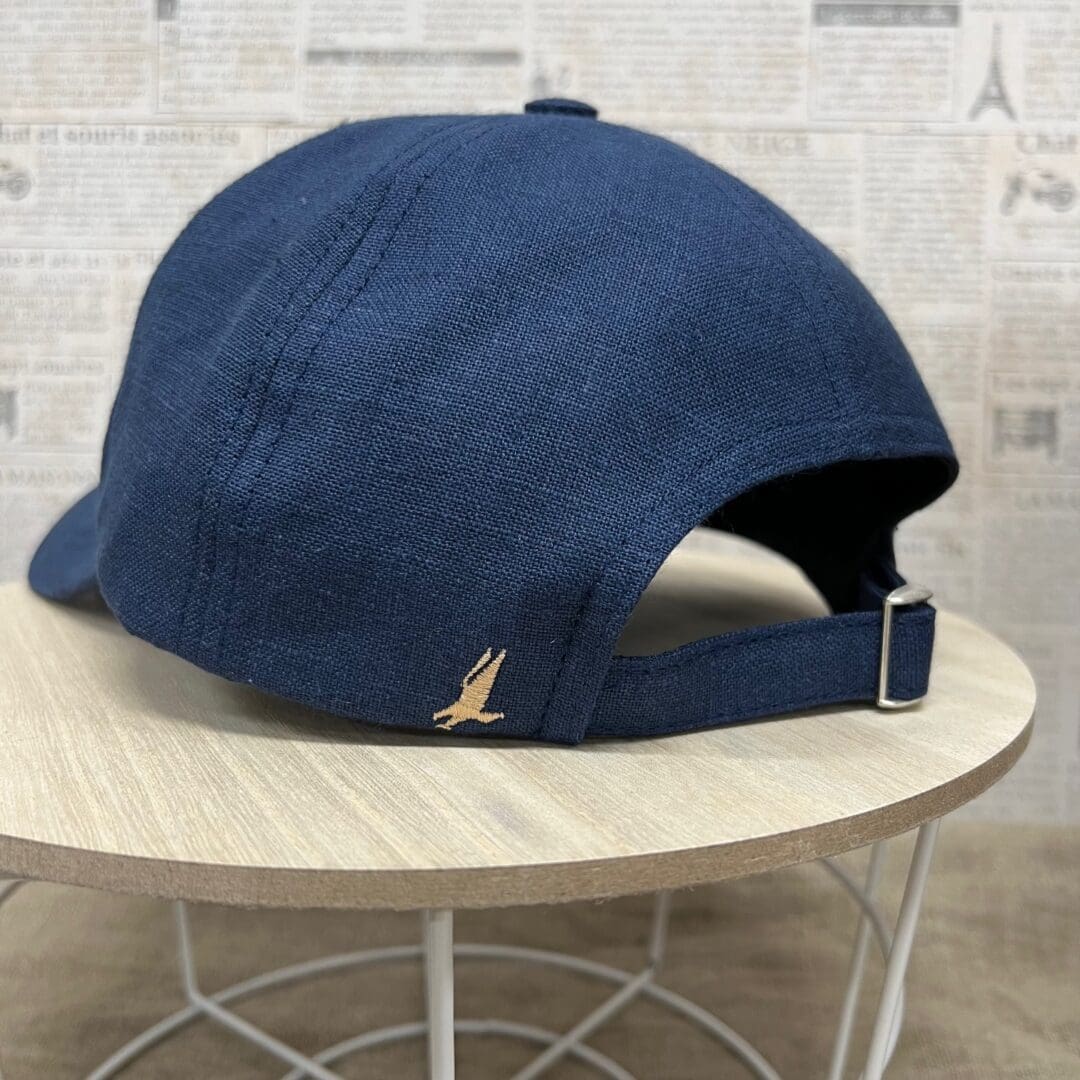 A hat sitting on top of a table.