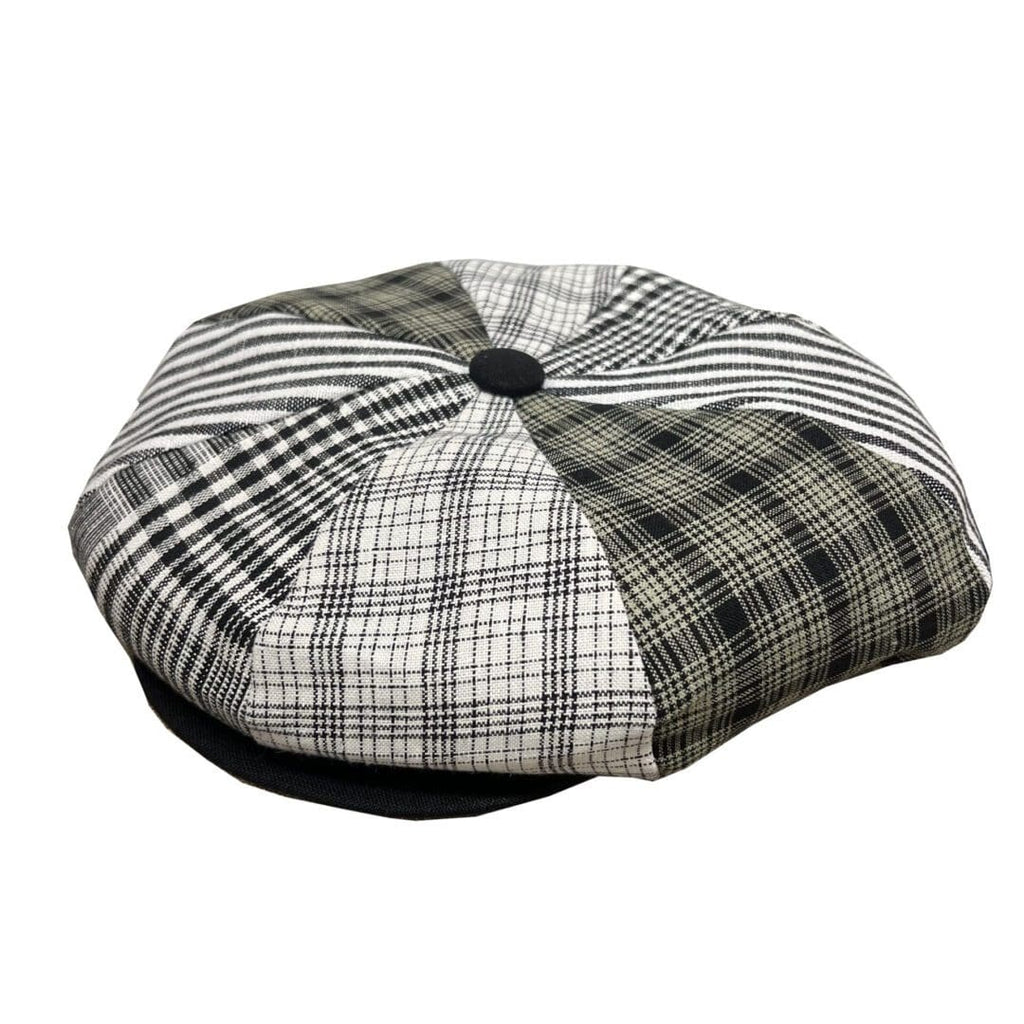 A black and white hat with plaid pattern.