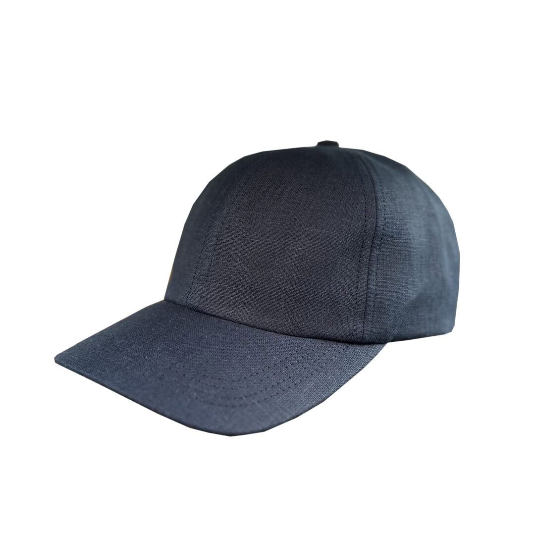 A black hat is on the ground