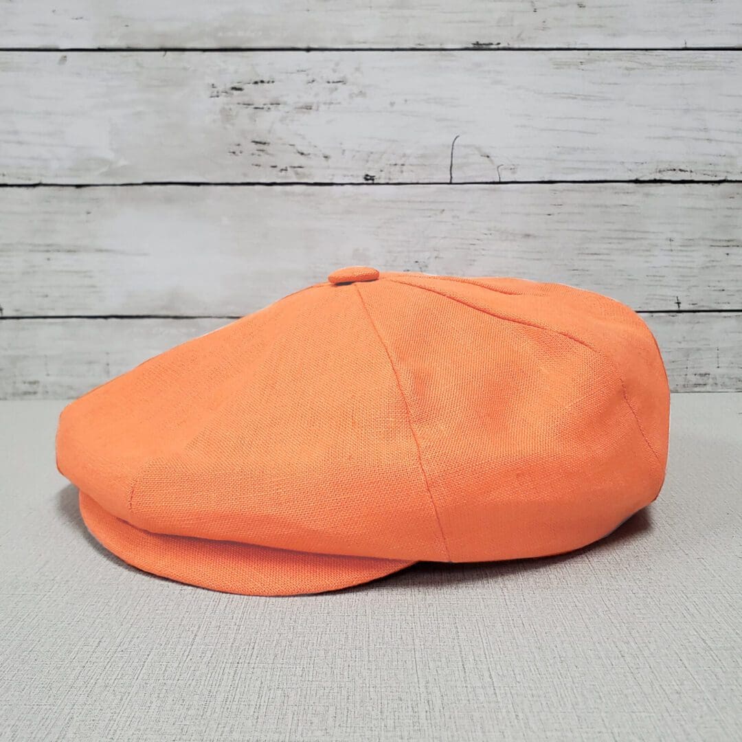 A hat is shown on top of a table.