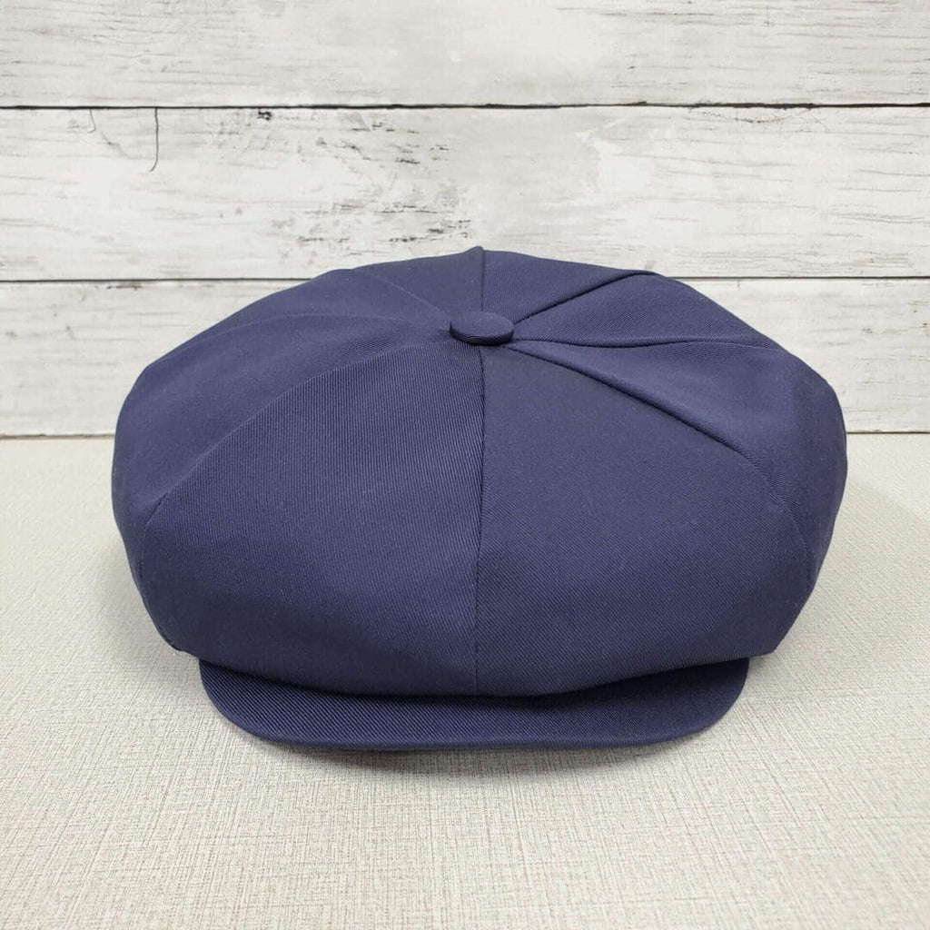 A blue hat is sitting on the floor
