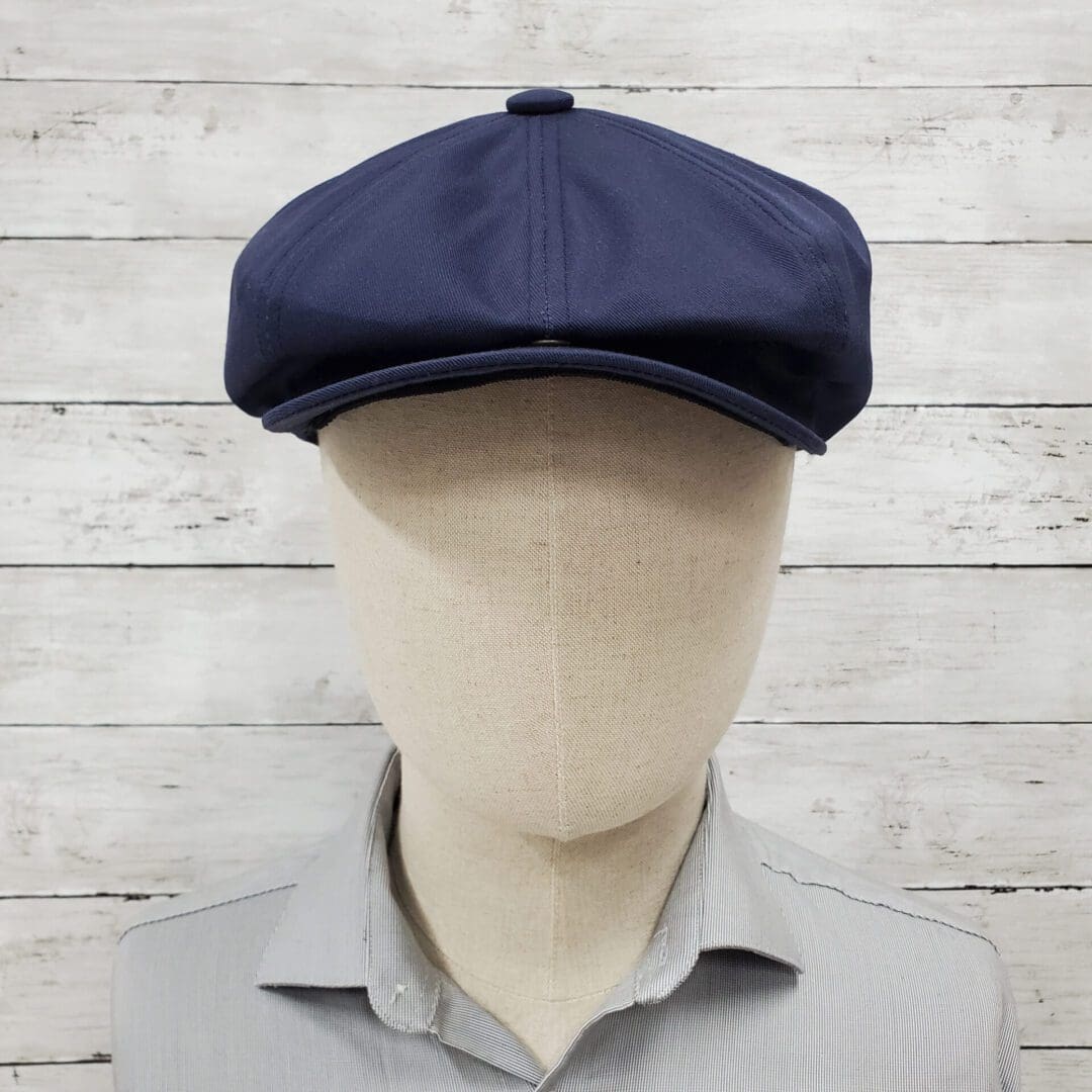 A man wearing a hat with no face.