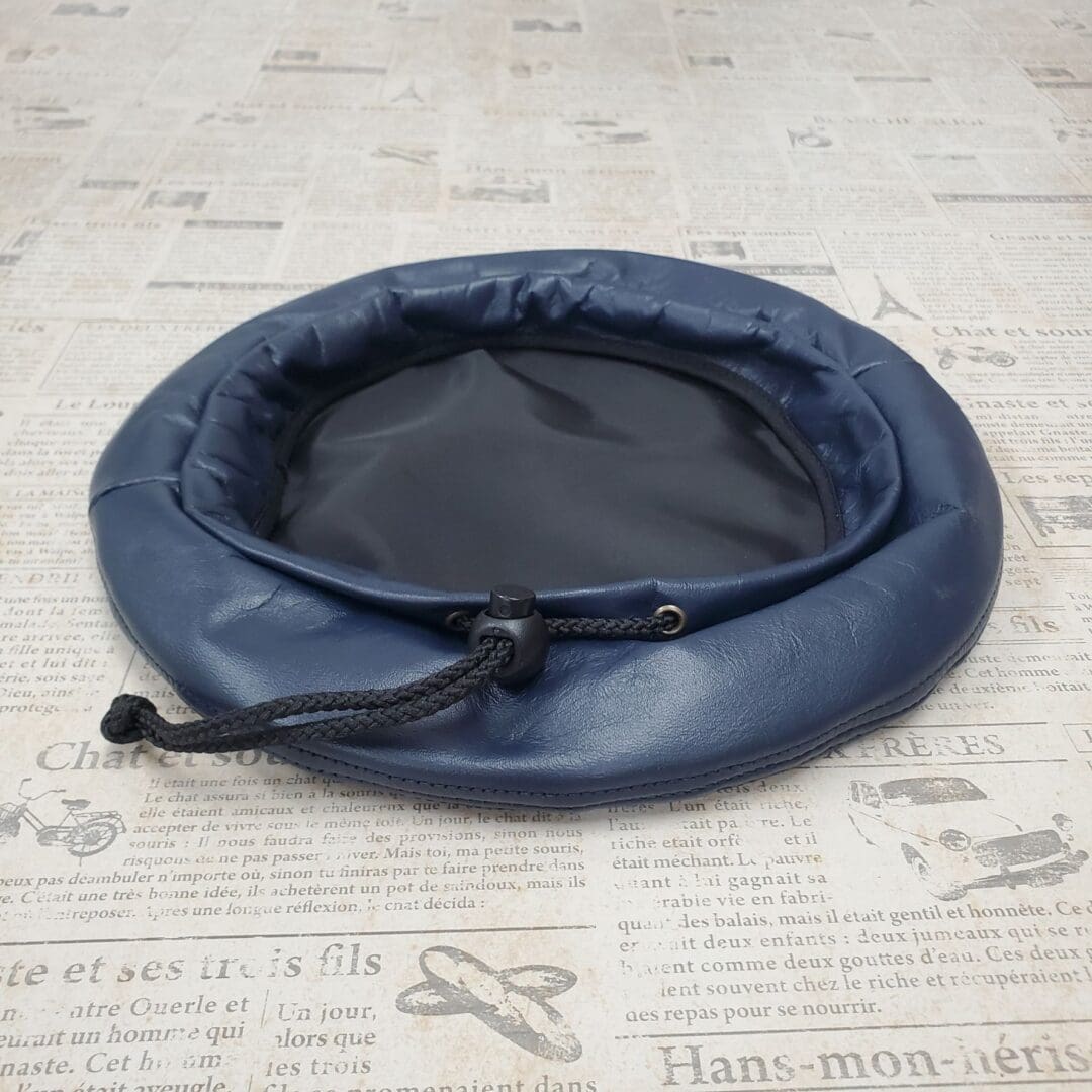 A blue bowl sitting on top of a table.