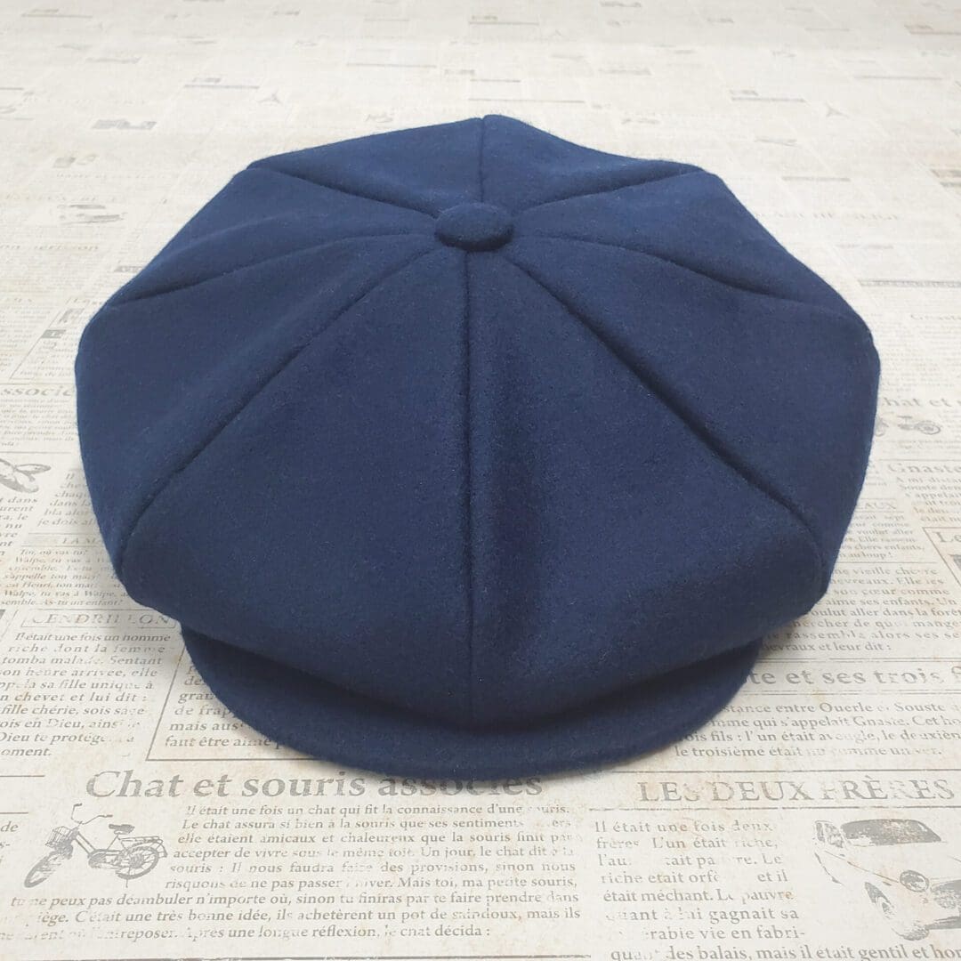 A blue hat is sitting on the floor