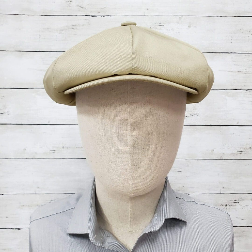 A man wearing a hat and a shirt