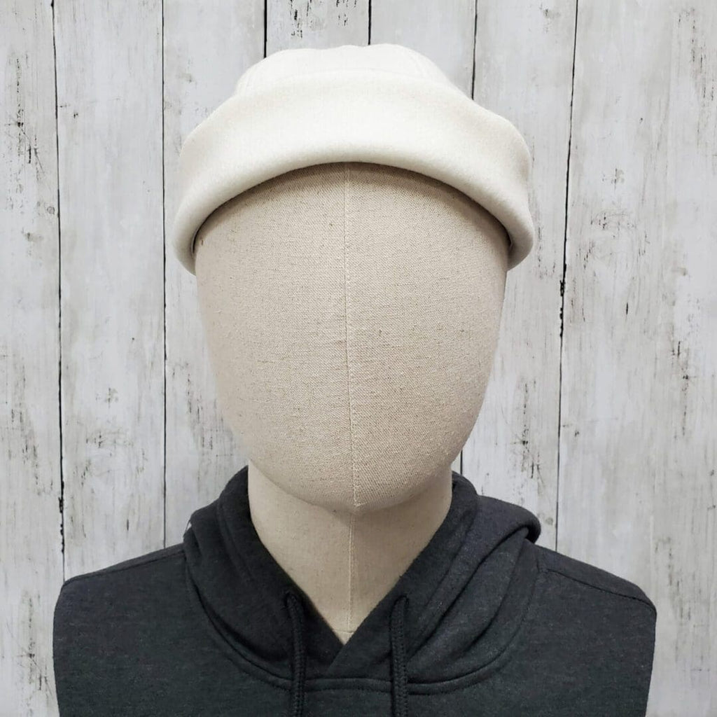 A person with a hat on their head