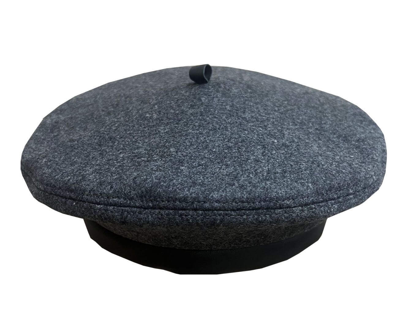 A gray hat is sitting on top of the floor.