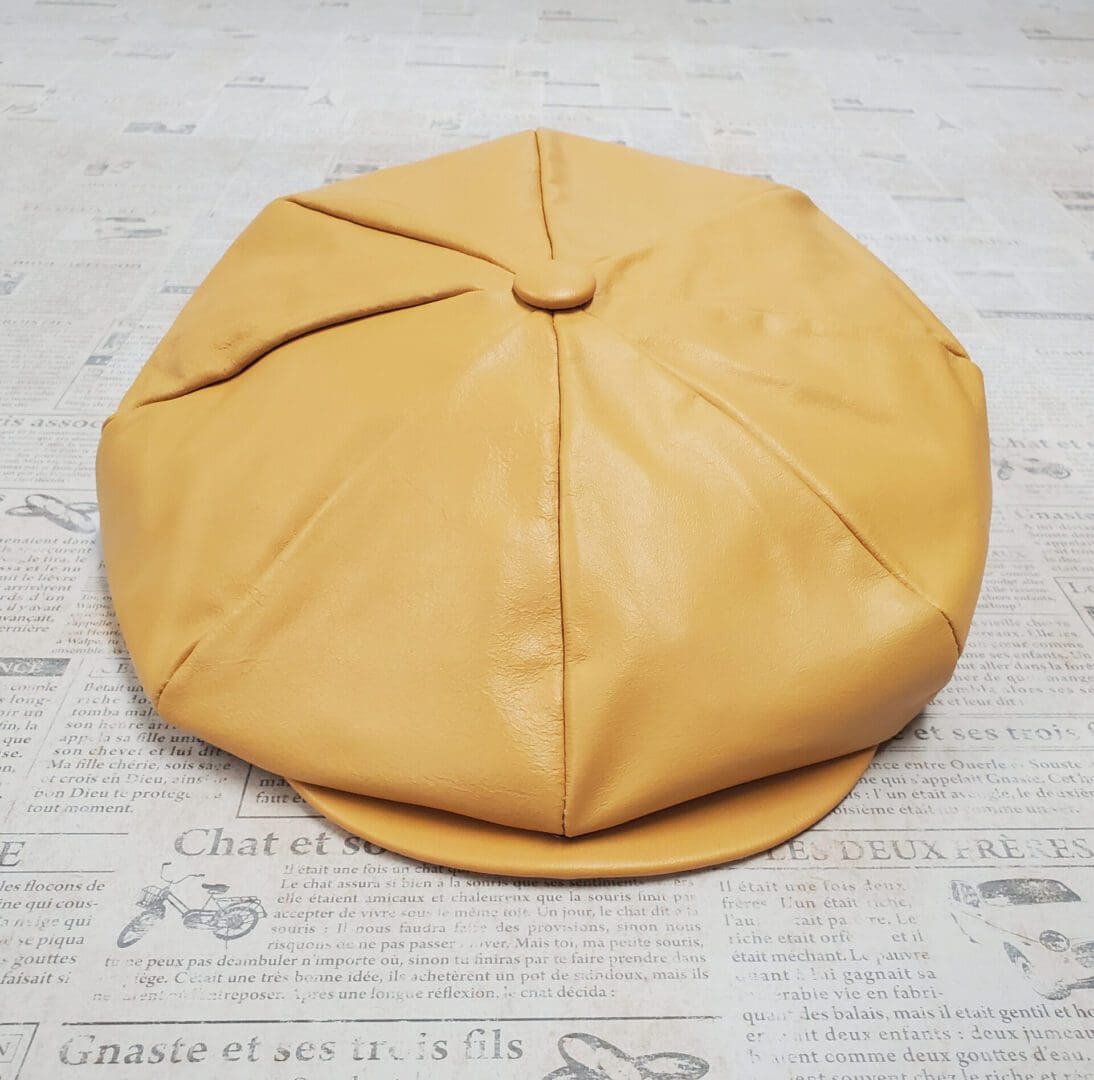 Gold Cowhide Leather Apple Newsboy Cap top