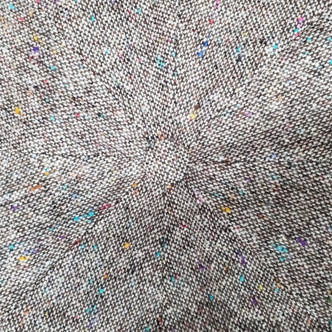 A close up of the fabric structure for a hat.