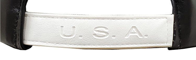 A white leather strap with the word " usa ".