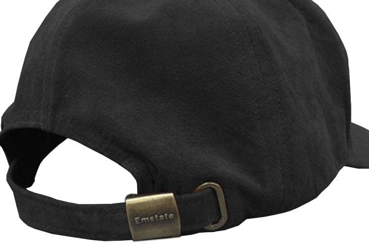 A black hat with a brass buckle on the side.