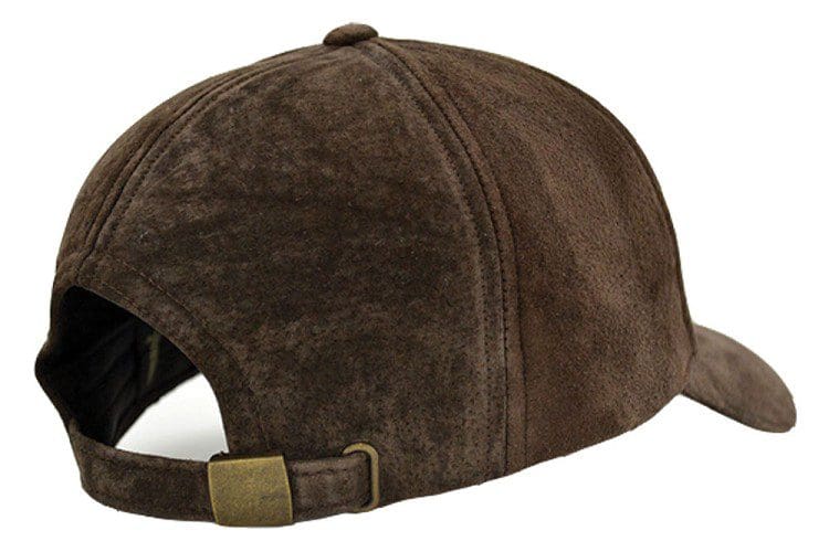 A brown hat is on the ground