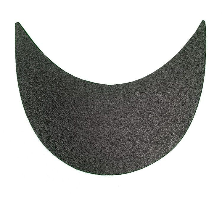 A black crescent shaped patch is shown.